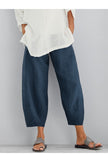 FJØRNA women's lightweight summer tapered trousers with elastic waist, breathable fabric, and loose-fit cropped design.