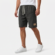 Men's linen shorts with elasticated waistband and drawstring, lightweight summer beach shorts by FJØRNA.