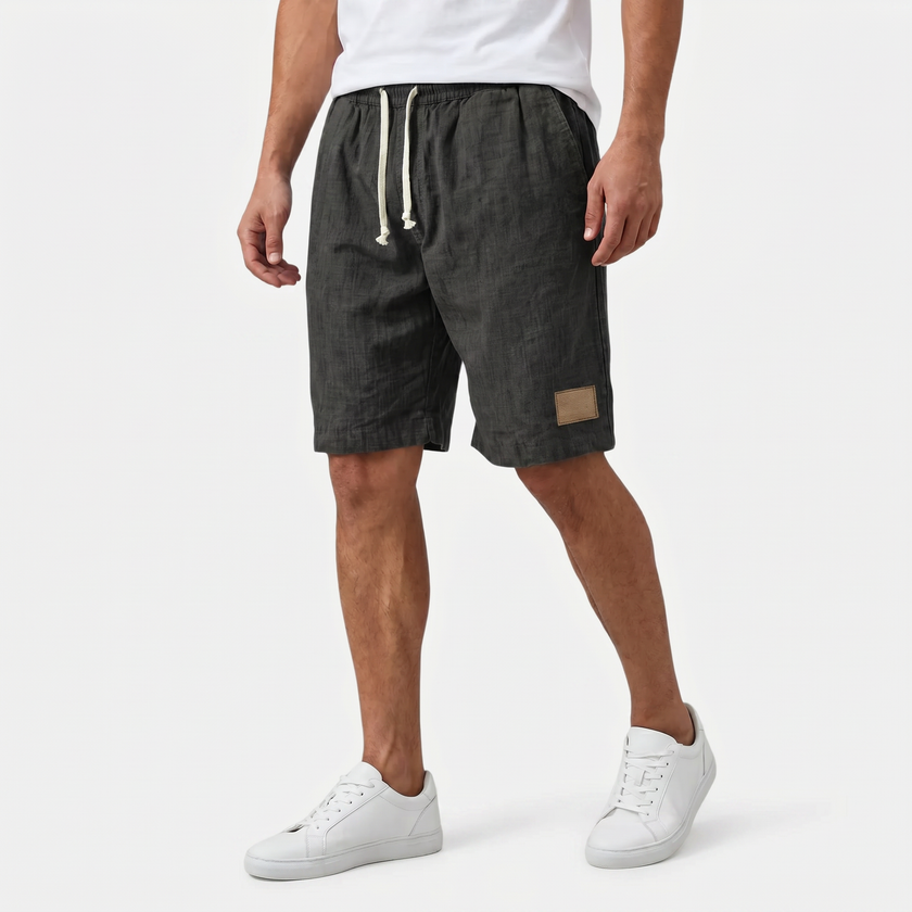 Men's linen shorts with elasticated waistband and drawstring, lightweight summer beach shorts by FJØRNA.
