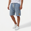 FJØRNA men's linen shorts with elastic waistband and drawstring, perfect for summer beachwear and relaxed outdoor style.