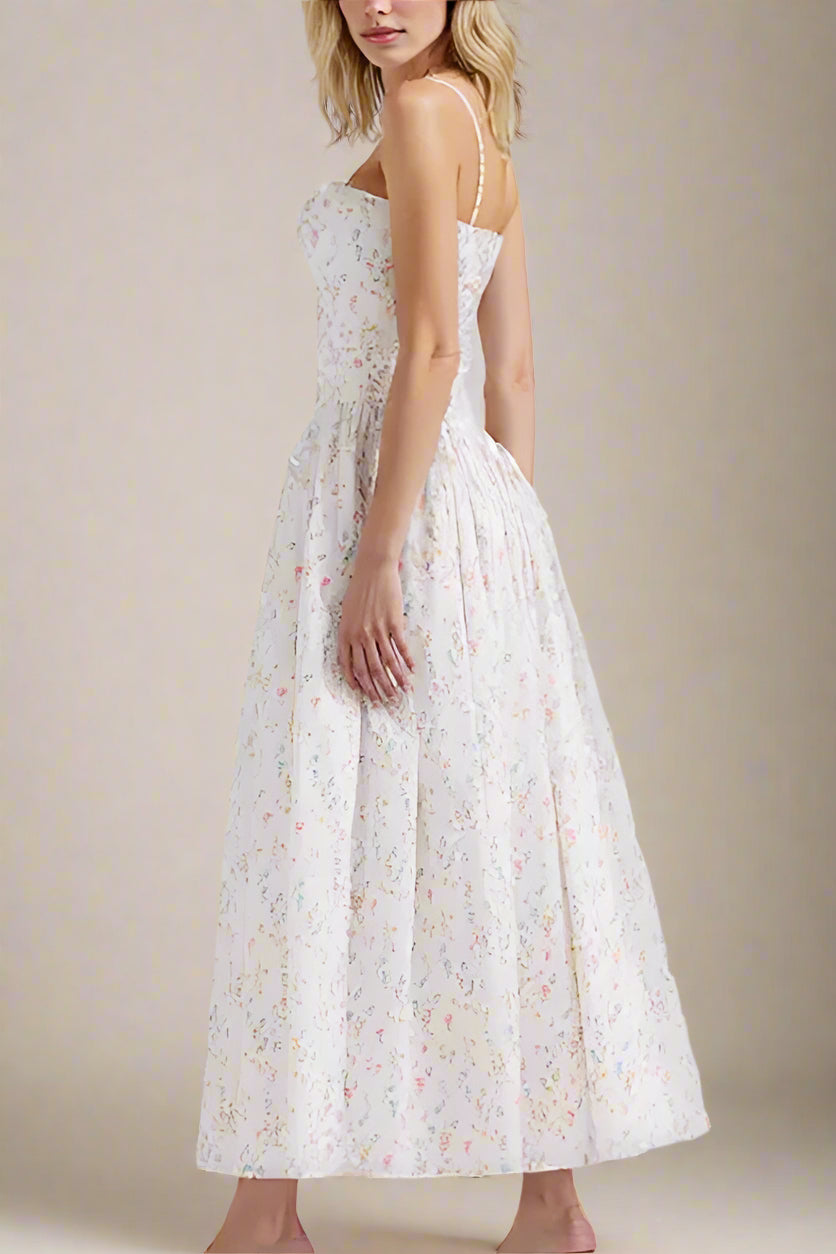 FJØRNA Tasmin women's white printed midi dress, bodycon style perfect for day to night wear, showcased on a model.
