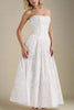 FJØRNA Tasmin women's white print midi dress, bodycon style, suitable for day to night wear, shown on a model.