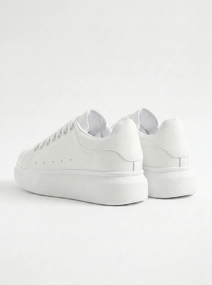 Back view of FJØRNA white lace-up men's minimalist trainers, designed for everyday style and casual wear.