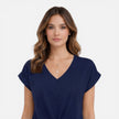 Women's V-neck Twist Front T-shirt by FJØRNA, soft casual summer top with short sleeves and stylish twist detail.