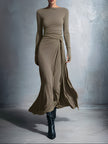 Flowy summer maxi dress for women by FJØRNA, featuring a wrap design and lightweight, breezy fabric for warm weather.