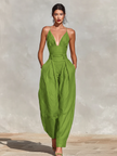 FJØRNA linen women's spaghetti strap jumpsuit with V-neck, high waist, pleated wide-leg pants, lightweight and stylish.