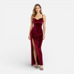 Women's velvet evening dress by FJØRNA featuring a slim fit, high slit, spaghetti straps, and a maxi length for elegant summer wear.