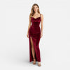Women's velvet evening dress by FJØRNA featuring a slim fit, high slit, spaghetti straps, and a maxi length for elegant summer wear.