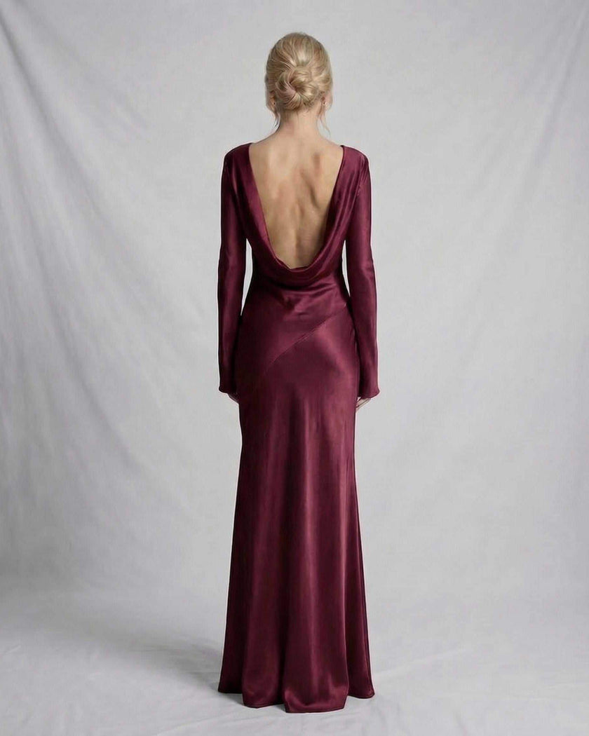 Burgundy satin maxi dress for women by FJØRNA, featuring a slim fit and elegant draped back design.