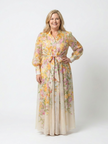 FJØRNA women's floral summer maxi dress with long sleeves, flowy fabric, and elegant design, perfect for warm-weather occasions.