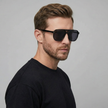 FJØRNA men's square sunglasses with black frames and dark lenses, one size fits all, stylish and modern design.