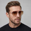 FJØRNA men's square sunglasses with one size fit, featuring a sleek black frame and tinted lenses for stylish sun protection.
