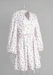 FJØRNA V-neck white floral mini dress with lantern sleeves, featuring a fitted bodice and delicate floral pattern.