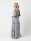 FJØRNA women's floral wrap summer maxi dress with flowing fabric and vibrant floral pattern, perfect for warm weather.