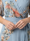 FJØRNA women's floral wrap summer maxi dress with lightweight fabric and vibrant floral pattern, perfect for warm weather.