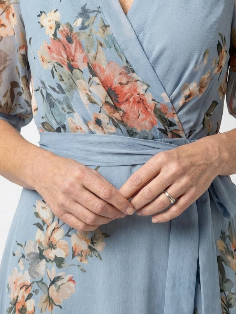 FJØRNA women's floral wrap summer maxi dress with lightweight fabric and vibrant floral pattern, perfect for warm weather.