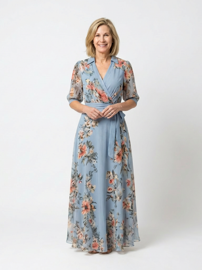 FJØRNA women's floral wrap summer maxi dress with a flowing silhouette and vibrant print, perfect for warm-weather occasions.