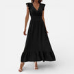 Women's sleeveless maxi dress by FJØRNA featuring a flowy fit and timeless style, shown in a relaxed, elegant design.