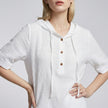 White FJØRNA summer women's blouse with short sleeves and linen fabric, stylish and lightweight for warm weather.
