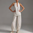 FJØRNA lightweight white two-piece halter V-neck suit with wide-leg trousers, stylish and comfortable for casual or summer wear.