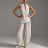 FJØRNA lightweight white two-piece halter V-neck suit with wide-leg trousers, stylish and comfortable for casual or summer wear.