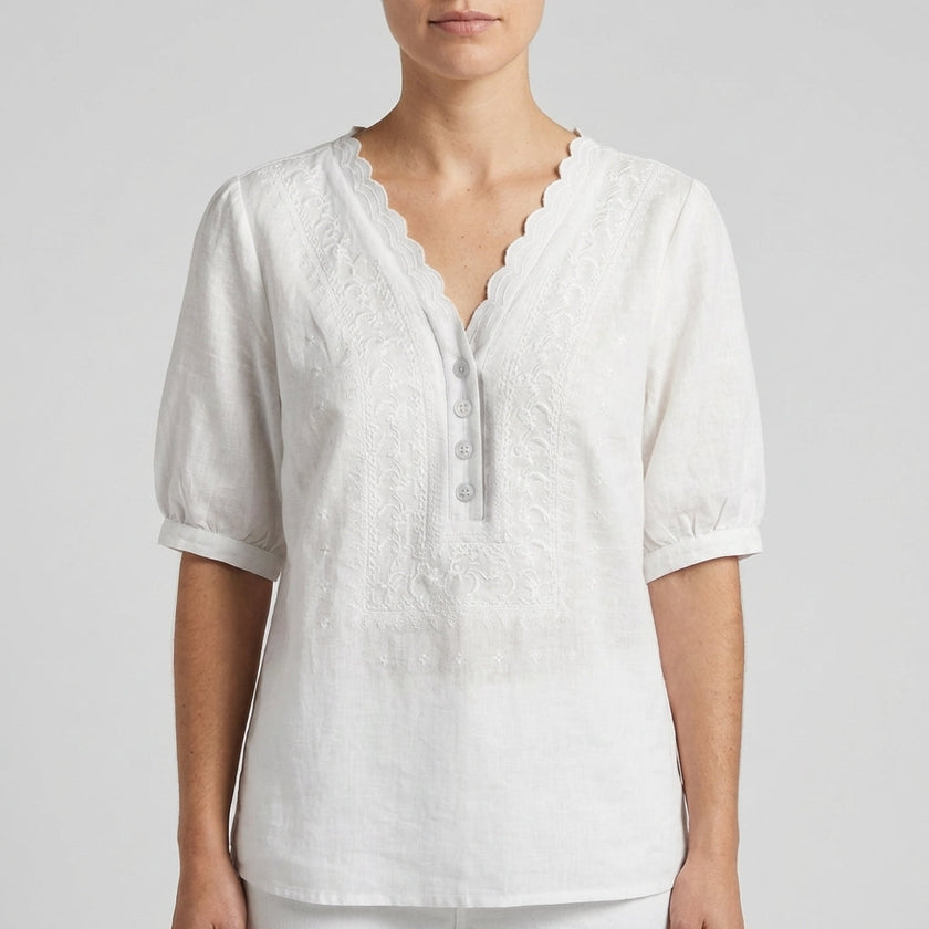 White FJØRNA women's summer blouse with V-neck, short sleeves, and linen fabric, casual and breathable for warm weather.
