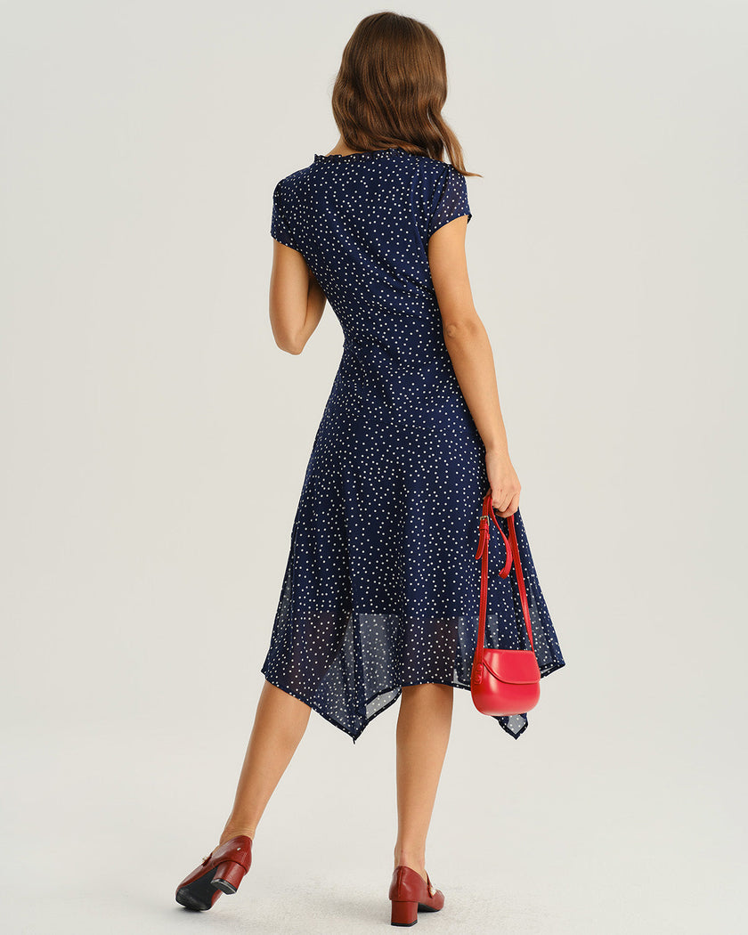 Navy blue polka dot chiffon midi dress for women with V-neck, tiered ruffles, and short sleeves by FJØRNA.