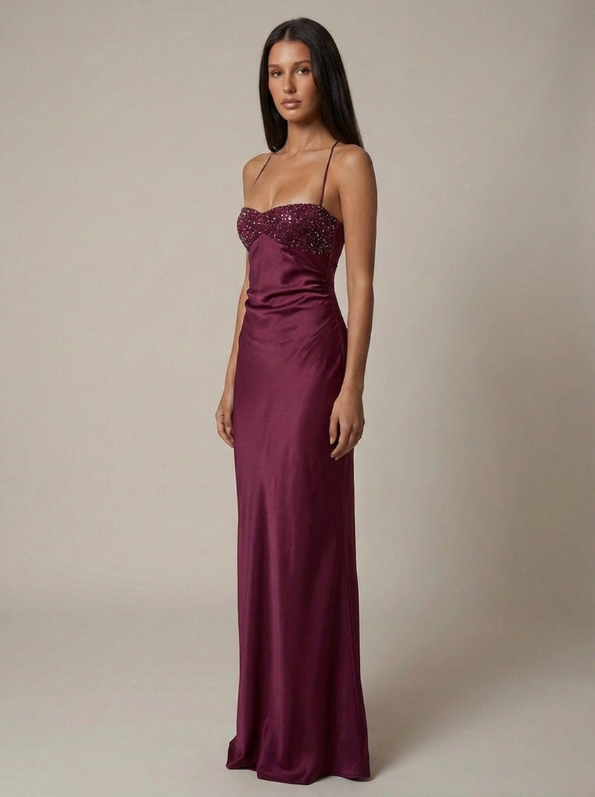 Women's satin halter maxi dress with beaded details by FJØRNA, featuring a flowing silhouette and elegant design.