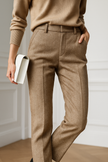FJØRNA women's wool blend trousers, stylish and warm pants with a tailored fit, in a neutral color, suitable for office or casual wear.