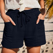 FJØRNA women's lightweight summer shorts with wide legs, drawstring waist, and side pockets, perfect for warm weather.