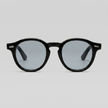 Men's round acetate sunglasses by FJØRNA featuring casual style and classic design, shown in a close-up image.