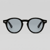 Men's round acetate sunglasses by FJØRNA featuring casual style and classic design, shown in a close-up image.