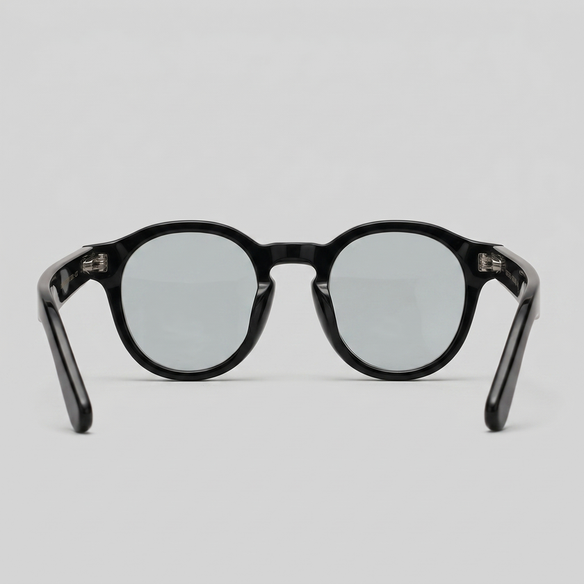Men's round acetate sunglasses by FJØRNA with casual style, featuring black frames and dark tinted lenses.