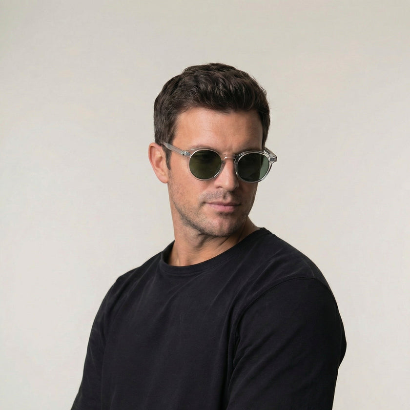 FJØRNA men's polarized outdoor sunglasses with glare-reducing lenses, stylish black frame, and reflective lenses for outdoor activities.
