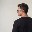 Men's polarized sunglasses by FJØRNA with glare-reducing lenses, suitable for outdoor activities and sunny conditions.