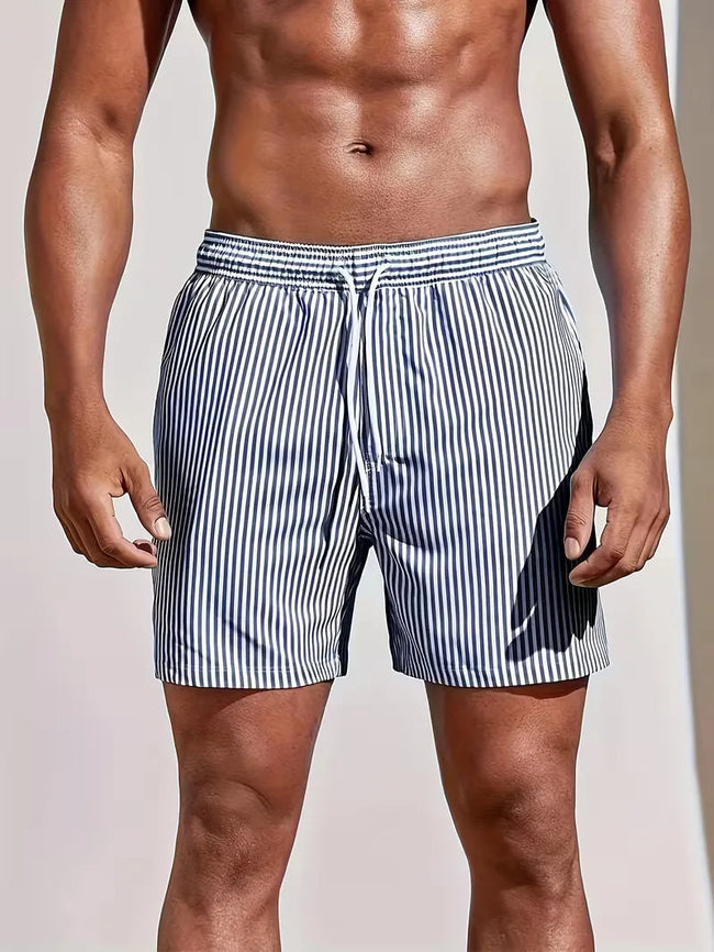 Men's striped regular fit swim shorts by FJØRNA, featuring a stylish design perfect for summer beach and pool activities.