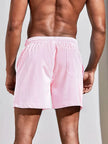 Men's striped regular fit swim shorts by FJØRNA featuring a colorful, casual design for beach and pool wear.