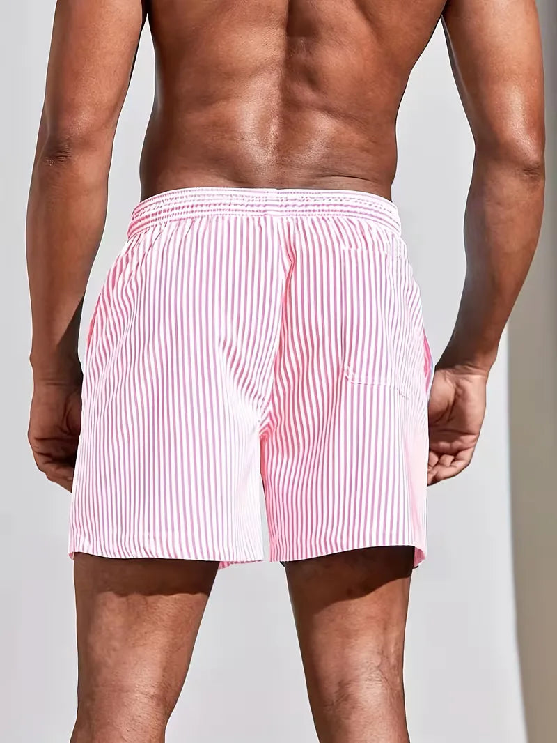 Men's striped regular fit swim shorts by FJØRNA featuring a colorful, casual design for beach and pool wear.